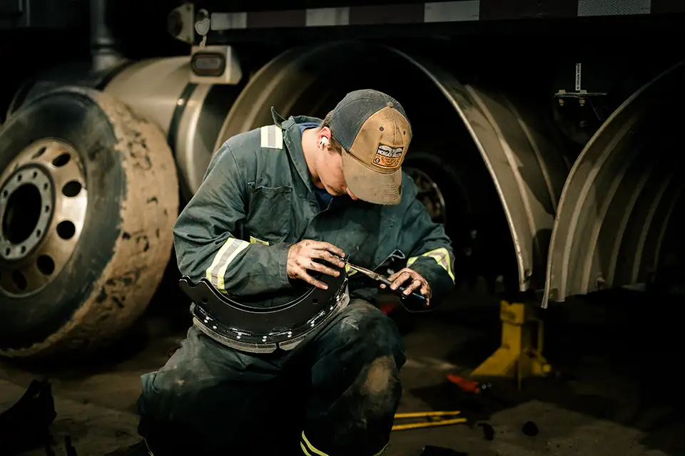 Mechanic performing repairs in Edmonton, Alberta