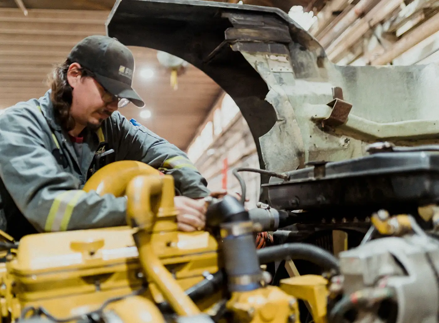 Diesel mechanic performing CVIP inspection in Edmonton, Alberta