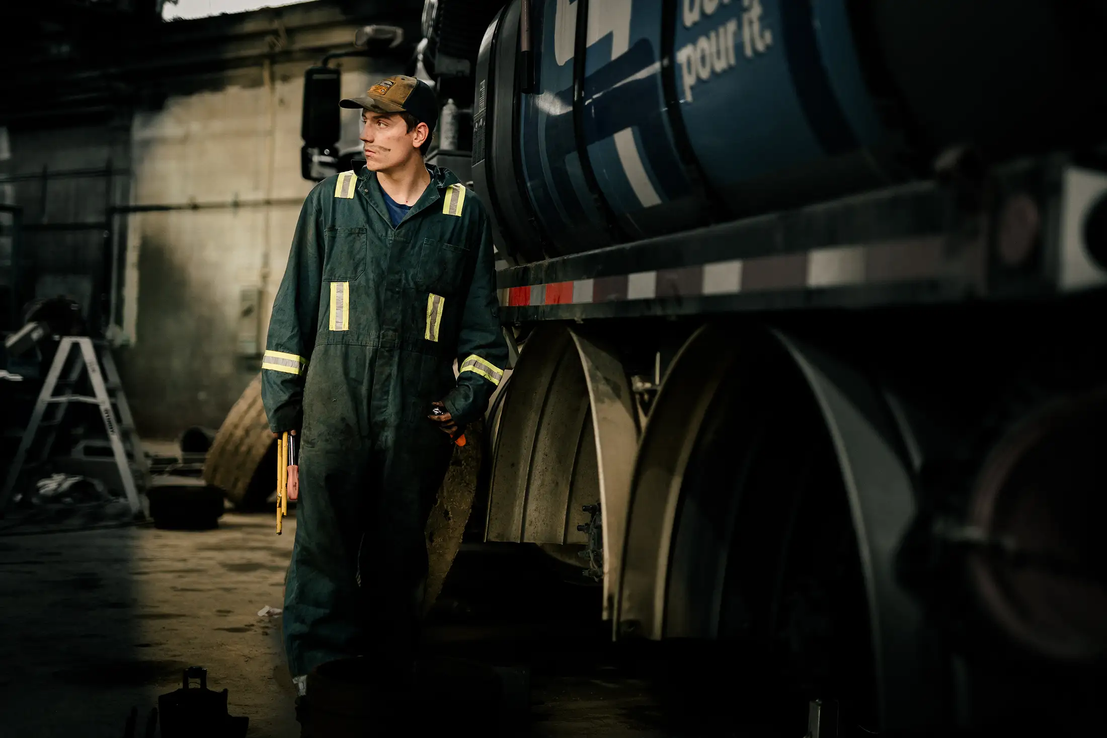 Diesel mechanic performing truck & trailer alignment services in Edmonton, Alberta